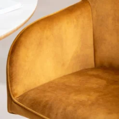 ClaudieFauteuil cosy pivotant en tissu avec pieds en métal