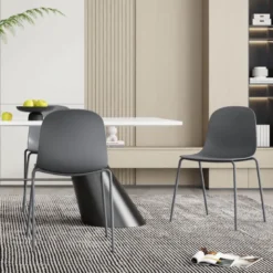 LilyChaise coque moderne empilable en polypropylène avec pieds en métal