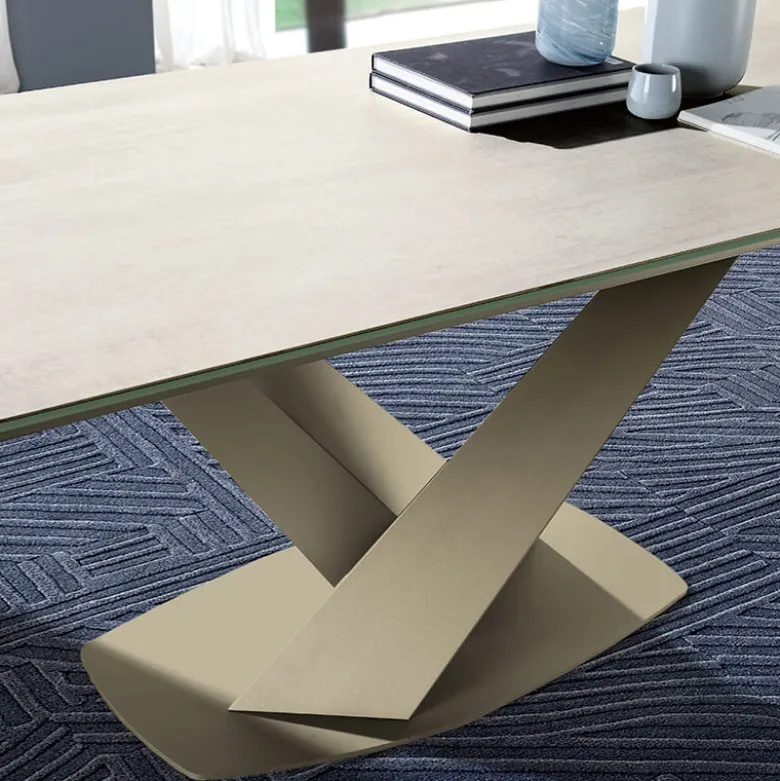 Victory Table design en céramique avec allonges pied central en V